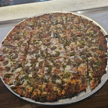 Mad Pizza - 16 Inch square cut pizza perfectly done with toppings to the edge! - Pizza Near Me - Hollywood, Florida Mad Pizza - 16 Inch square cut pizza perfectly done with toppings to the edge! - Pizza Near Me - Hollywood, Florida