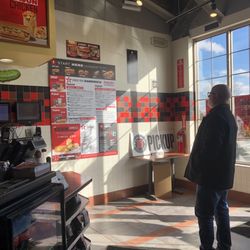 Jimmy John's - Guy looking at a menu