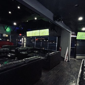 Ignite Hookah Lounge - black leather couches and televisions - Hookah Bars Near Me - Shelby Township, Michigan