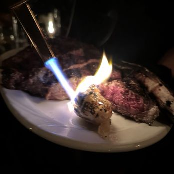 Gaslamp - Roasted garlic done tableside with the Tomohawk - Steakhouses Near Me - Kailua, Hawaii Gaslamp - Roasted garlic done tableside with the Tomohawk - Steakhouses Near Me - Kailua, Hawaii