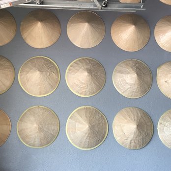 Shank & Bone - wall of conical hats - Vietnamese Near Me - San Diego, California Shank & Bone - wall of conical hats - Vietnamese Near Me - San Diego, California