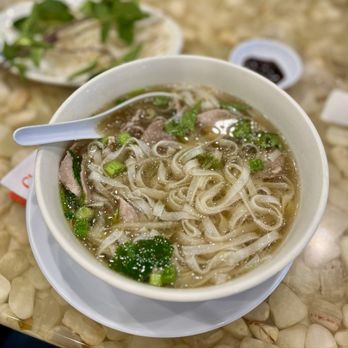 Pho So 1 - Rare steak phở with fresh noodle (flat noodle). The flat one paired really well with the broth - Vietnamese Near Me - Lake Forest, California Pho So 1 - Rare steak phở with fresh noodle (flat noodle). The flat one paired really well with the broth - Vietnamese Near Me - Lake Forest, California