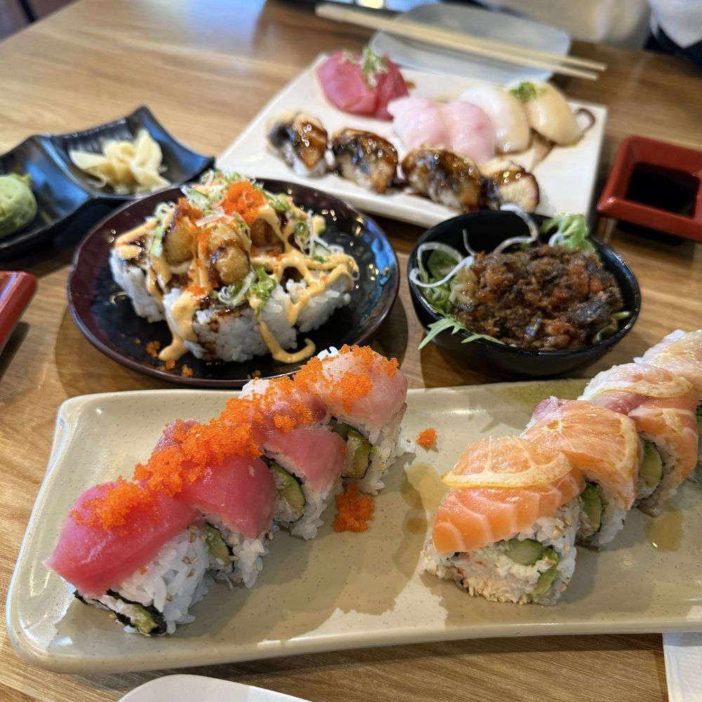Lemon Roll, Salmon Skin Salad, Freshwater Eel Nigiri Sushi, Yellowtail Nigiri Sushi, Tuna Nigiri Sushi, Volcano Roll Lemon Roll, Salmon Skin Salad, Freshwater Eel Nigiri Sushi, Yellowtail Nigiri Sushi, Tuna Nigiri Sushi, Volcano Roll