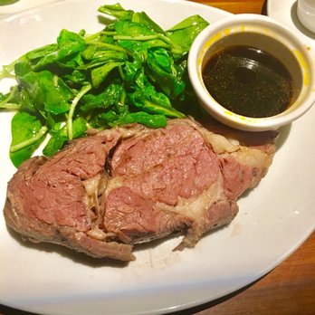 Stoney River - Prime rib with side of sautéed spinach - Steakhouses Near Me - Deer Park, Illinois Stoney River - Prime rib with side of sautéed spinach - Steakhouses Near Me - Deer Park, Illinois