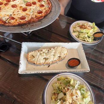 Eno’s Pizza Tavern - Gluten free pepperoni, salad and Truffle Cheese Bread - Pizza Near Me - Dallas, Texas Eno’s Pizza Tavern - Gluten free pepperoni, salad and Truffle Cheese Bread - Pizza Near Me - Dallas, Texas