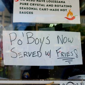 Avenue Saint Charles - a sign in the window of a restaurant - Cajun/Creole Near Me - Beaverton, Oregon Avenue Saint Charles - a sign in the window of a restaurant - Cajun/Creole Near Me - Beaverton, Oregon