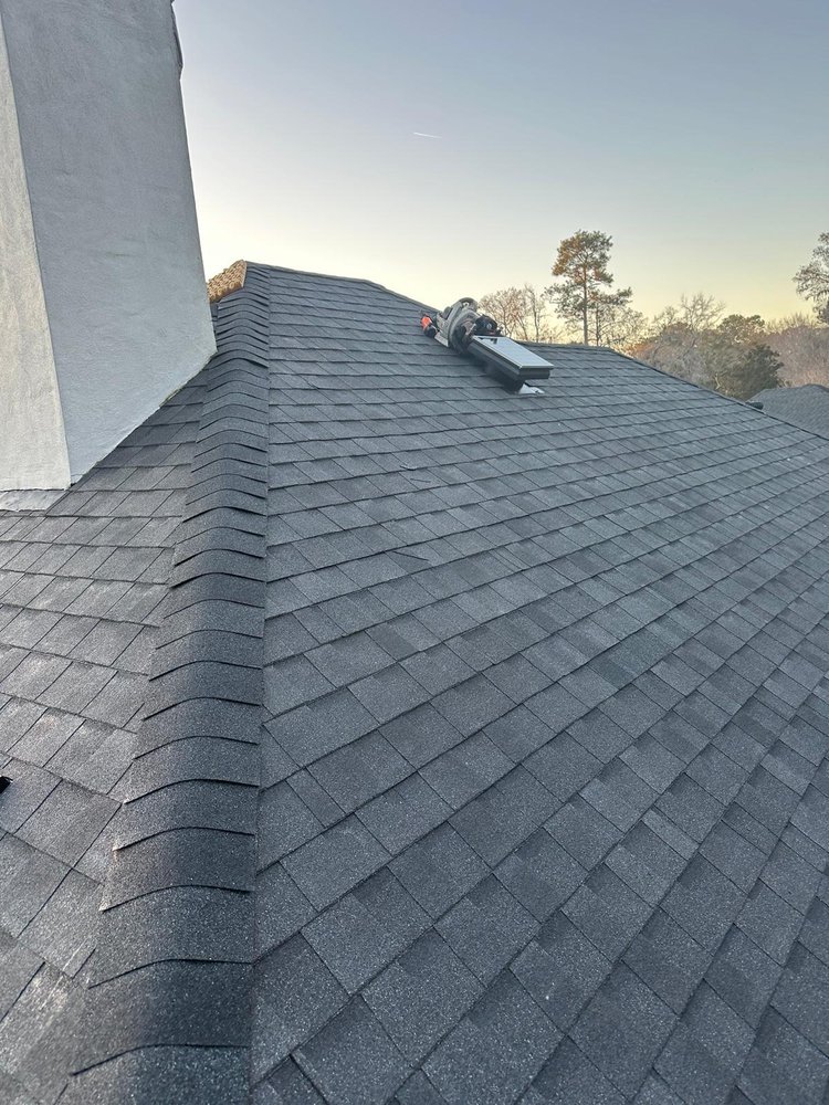 Slide of Palma's Roofing Experts