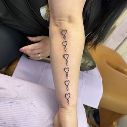 Infiniti Tattoos & Piercing Studio