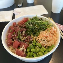 My poke consist of fresh tuna with spicy crab, edamame, green onion, and seaweed. Topped with sesame and Durham !!' YUMMO !' My poke consist of fresh tuna with spicy crab, edamame, green onion, and seaweed. Topped with sesame and Durham !!' YUMMO !'