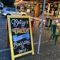 Betzy's tacos - Look for this sign in West Side of parking lot.