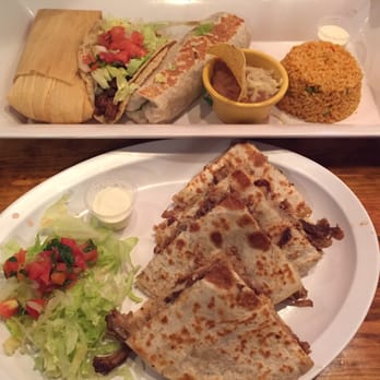 Combo#3 A delicious beef burrito, 1 chicken taco served with 2 tortillas, one chicken tamal & rice- mole. Carnitas quesadilla!!!