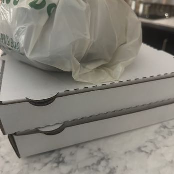 Café 36 - Packaged to go: two pizzas and mango glazed salmon - New American Near Me - Kalamazoo, Michigan Café 36 - Packaged to go: two pizzas and mango glazed salmon - New American Near Me - Kalamazoo, Michigan
