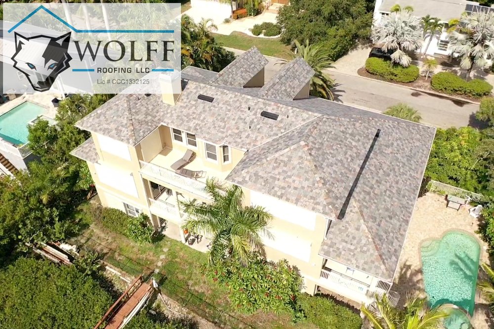 Slide of Wolff Roofing