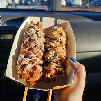 Oh K‐Dog - Sweet potato, half cheese, half hot dog topped with cinnamon.  One with garlic sauce and one with mustard. - Hot Dogs Near Me - Burlington, Massachusetts