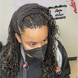 Tasha Hair Braiding & Boutiques