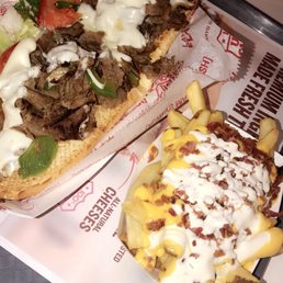 Large Philly Cheesesteak Sandwich with Ultimate Fries Large Philly Cheesesteak Sandwich with Ultimate Fries
