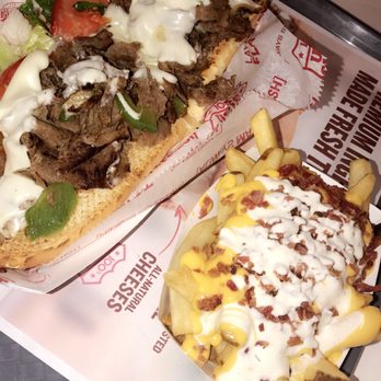 Charleys Cheesesteaks - Large Philly Cheesesteak Sandwich with Ultimate Fries - Sandwiches Near Me - Concord, California Charleys Cheesesteaks - Large Philly Cheesesteak Sandwich with Ultimate Fries - Sandwiches Near Me - Concord, California