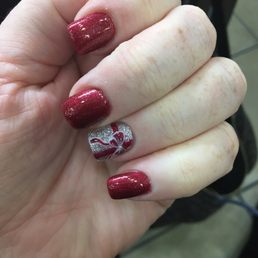 I asked for red gel nails and my ring finger to be silver with a bow. Exactly what I wanted