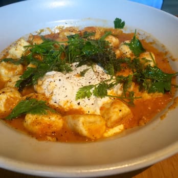Tre Rivali - Ricotta gnocchi and roasted tomato sauce - Mediterranean Near Me - Milwaukee, Wisconsin Tre Rivali - Ricotta gnocchi and roasted tomato sauce - Mediterranean Near Me - Milwaukee, Wisconsin