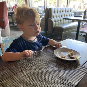 Del Frisco's Double Eagle Steak House - Little one is enjoying his dinner - Bars Near Me - Orlando, Florida Del Frisco's Double Eagle Steak House - Little one is enjoying his dinner - Bars Near Me - Orlando, Florida