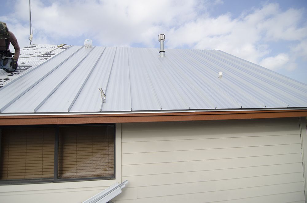 Slide of Freetail Roofing