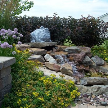 Signature - a garden with rocks and flowers - Landscaping Near Me - South Elgin, Illinois Signature - a garden with rocks and flowers - Landscaping Near Me - South Elgin, Illinois