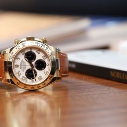 Newport Watch Club - Rolex - Audemars Piguet - Patek Philippe - A true gentleman's watch. The Rolex Daytona 116518 in 18k gold on a brown leather strap.