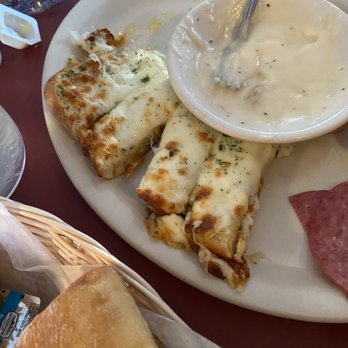 Rosa's Squeeze Inn - Garlic cheese bread - Italian Near Me - Millersburg, Michigan Rosa's Squeeze Inn - Garlic cheese bread - Italian Near Me - Millersburg, Michigan