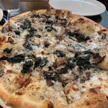 Ollo - Wild mushroom and spinach pizza - New American Near Me - Malibu, California Ollo - Wild mushroom and spinach pizza - New American Near Me - Malibu, California
