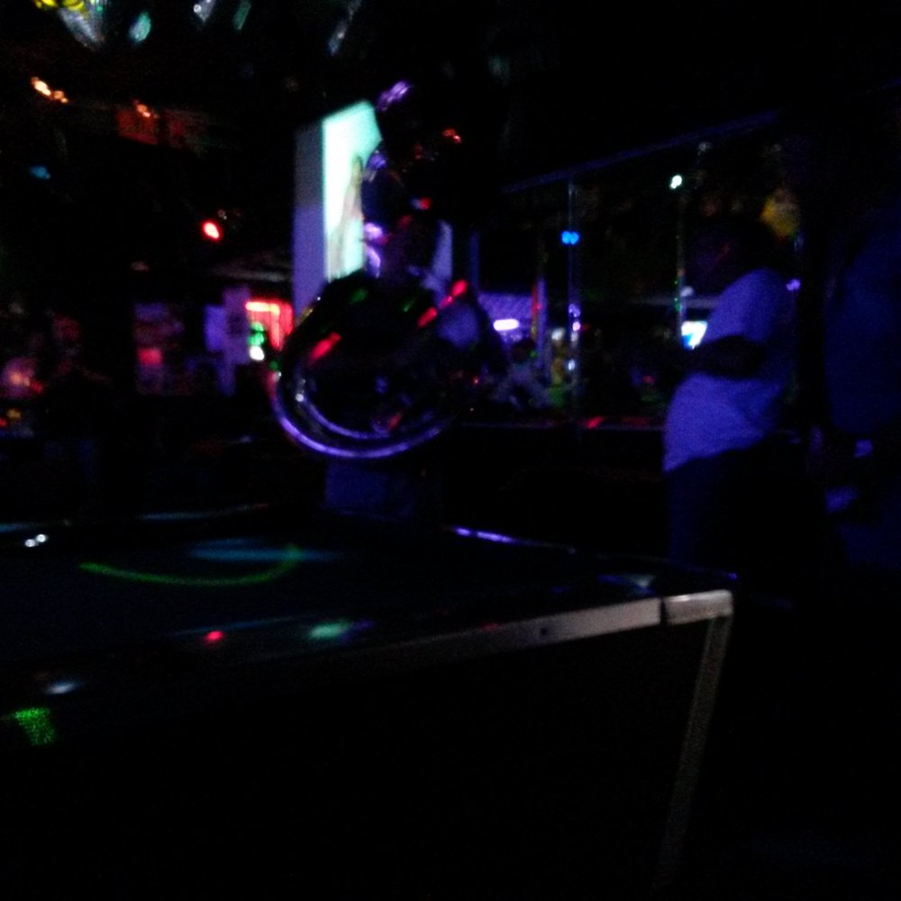 Shamrock Bar - a man playing air hockey in the dark - Cocktail Bars Near Me - Huntington Park, California Shamrock Bar - a man playing air hockey in the dark - Cocktail Bars Near Me - Huntington Park, California