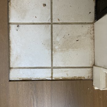 Flooring Atlanta - a dirty bathroom with a window - Carpeting Near Me - Norcross, Georgia Flooring Atlanta - a dirty bathroom with a window - Carpeting Near Me - Norcross, Georgia