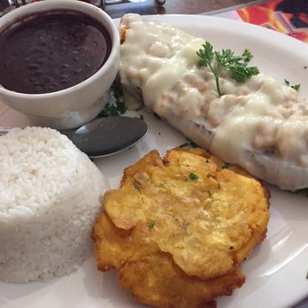 Casa Juan Restaurant - Platano relleno - stuffed plantain Monday Special with rice, black beans and tostones. The plantain is under all that cheese - Latin American Near Me - Miami, Florida Casa Juan Restaurant - Platano relleno - stuffed plantain Monday Special with rice, black beans and tostones. The plantain is under all that cheese - Latin American Near Me - Miami, Florida