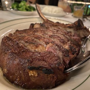 Wolfgang's Steakhouse - Tomahawk steak  Great service !! Thank you to Emmanuel for taking care of us !! - Steakhouses Near Me - Honolulu, Hawaii