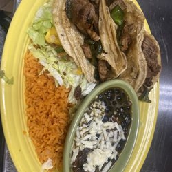Real Hacienda Paris - Tacos coyotes this dish one of my favorites making with sirloin steak poblano peppers black beans rice lettuce and mango sauce