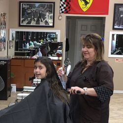 Daniel's Barber Shop - Even little girls love Daniels Barber shop.
Thank you Lora.
Nicole's loves her new look.