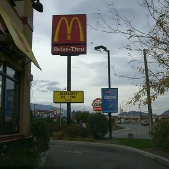 McDonald's - a mcdonald's drive thru sign and a mcdonald's drive thru sign - Fast Food Near Me - Osoyoos, British Columbia
