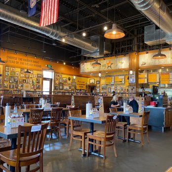 Mission BBQ - Dining room decor honors military and police. - Southern Near Me - Charlottesville, Virginia