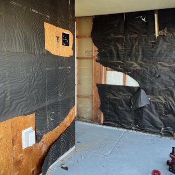 J. Floyd Lath & Plaster - (2/6): After John removed the original wood siding. He later added plywood, house wrap, and tar paper to fix all the gaps. - Stucco Services Near Me J. Floyd Lath & Plaster - (2/6): After John removed the original wood siding. He later added plywood, house wrap, and tar paper to fix all the gaps. - Stucco Services Near Me