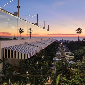 Hotel del Coronado, Curio Collection by Hilton - Hotel restaurant sunset reflection - Coronado, CA