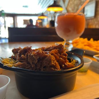 Outlaw Burgers & BBQ - Loaded potato and a wine-a-rita. - Burgers Near Me - Justin, Texas Outlaw Burgers & BBQ - Loaded potato and a wine-a-rita. - Burgers Near Me - Justin, Texas