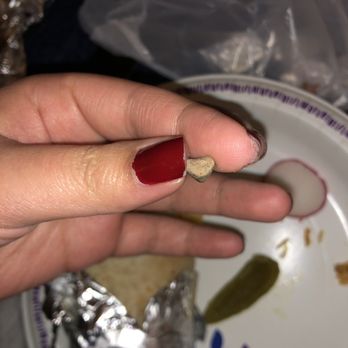 Taqueria El Grullo - At first I thought it was an extra burnt piece of meat. Cleaned it up and it's a ROCK IN MY BURRITO!! - Mexican Near Me - Oakland, California Taqueria El Grullo - At first I thought it was an extra burnt piece of meat. Cleaned it up and it's a ROCK IN MY BURRITO!! - Mexican Near Me - Oakland, California