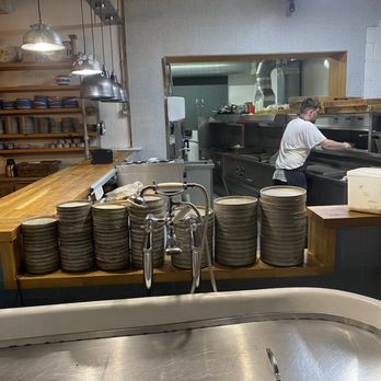 The Scallop Shell - Looking into the kitchen. They were cleaning after closing. They seriously did not rush us! - Fish & Chips Near Me - Bath, BAS