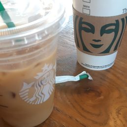 Ice cold brew coffee and a hot coffee Ice cold brew coffee and a hot coffee