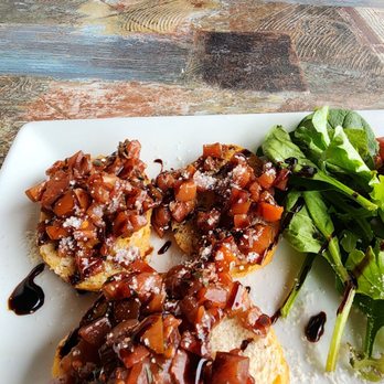Tortuga's Kitchen & Bar - Rosemary brouchetta with vinaigrette. Great starter - Bars Near Me - Flagler Beach, Florida Tortuga's Kitchen & Bar - Rosemary brouchetta with vinaigrette. Great starter - Bars Near Me - Flagler Beach, Florida