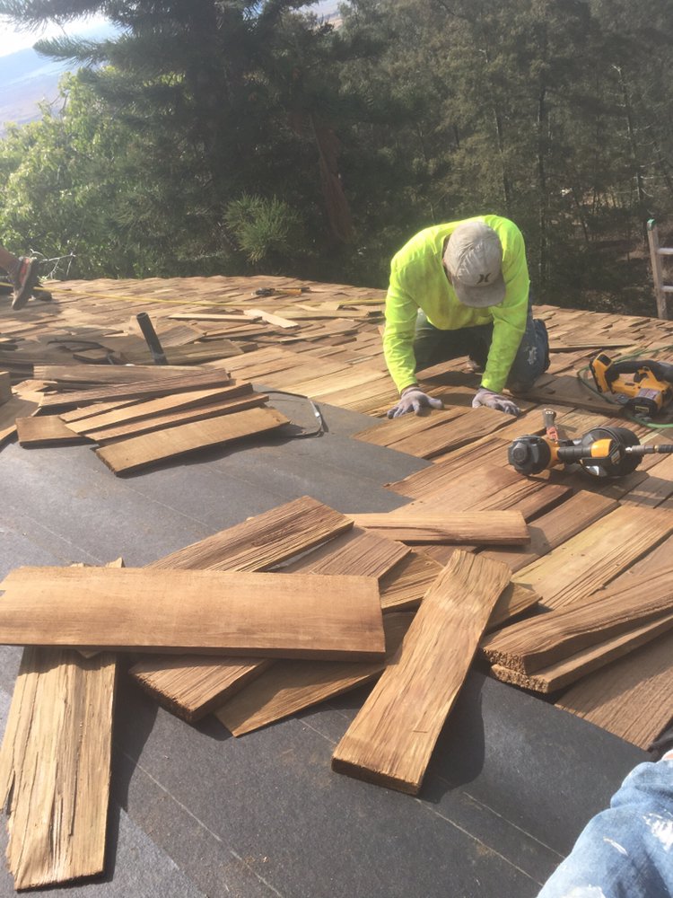 Slide of Valley Isle Roofing