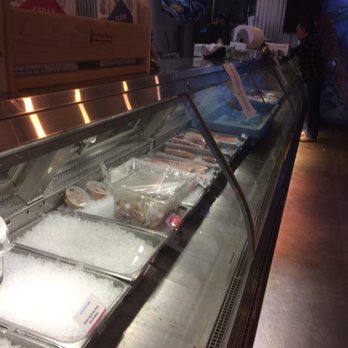 Aquarius Fish - Fresh fish truck was just pulling up as they opened their doors to fill the case. - Seafood Markets Near Me - Salt Lake City, Utah