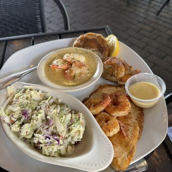 Sharky's Waterfront Grill - WHITE SHARK BROILED PLATTER Broiled Tilapia, Shrimp, Seafood Stuffed Shrimp, Seafood Cake and Shrimp Scampi- coleslaw. - Seafood Near Me - Kingwood, Texas