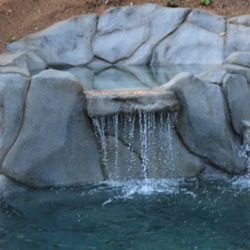 Yuba River Swimming Holes and Pools - Custom built spa with natural stone detail in Auburn, California. Designed for relaxation and year-round use, this spa integrates perfectly