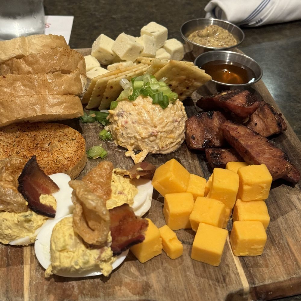 State Fare Kitchen & Bar - Cheeses, sausage, bread, deviled eggs w bacon - New American Near Me - Houston, Texas State Fare Kitchen & Bar - Cheeses, sausage, bread, deviled eggs w bacon - New American Near Me - Houston, Texas