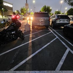 LA Fitness - Why is this bus parked in motorcycle parking. There is no exits for this.